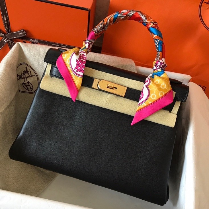 H**mes kelly retourne 28 handmade bag in black swift calfskin
