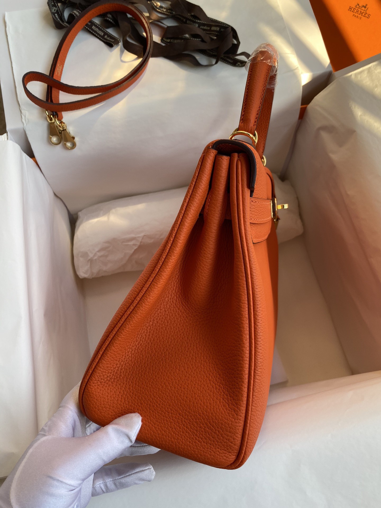 H**mes kelly retourne 32 handmade bag in orange clemence leather