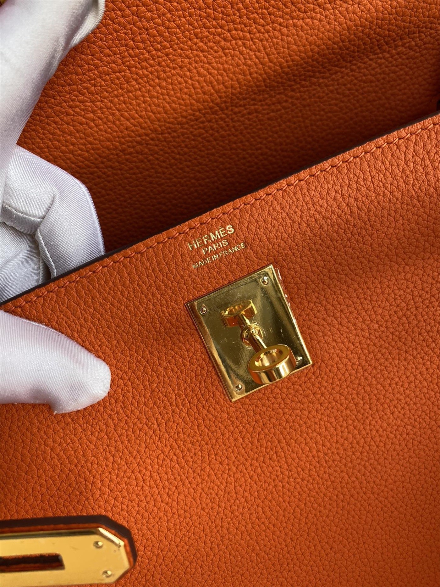 H**mes kelly retourne 32 handmade bag in orange clemence leather