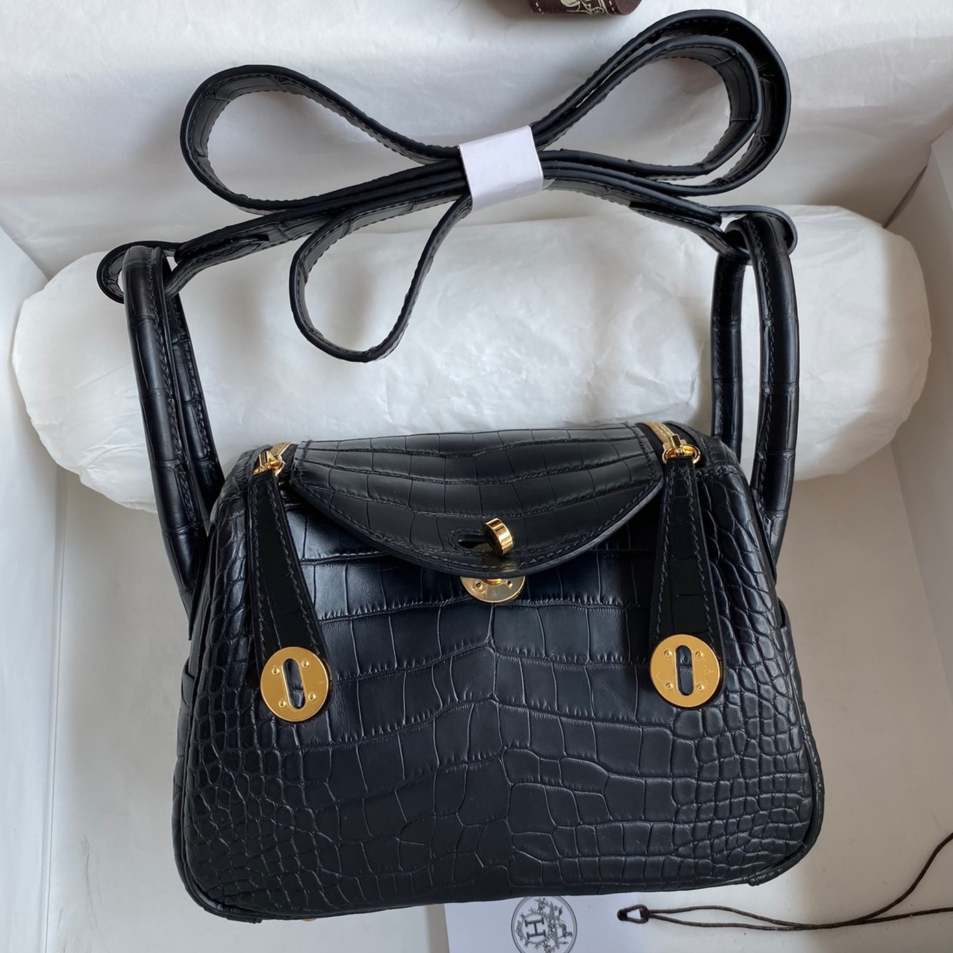 H**mes mini lindy handmade bag in black matte alligator leather