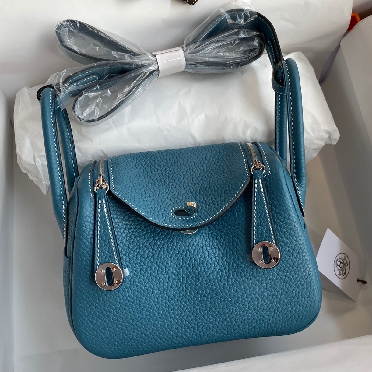 H**mes mini lindy handmade bag in blue jean clemence leather