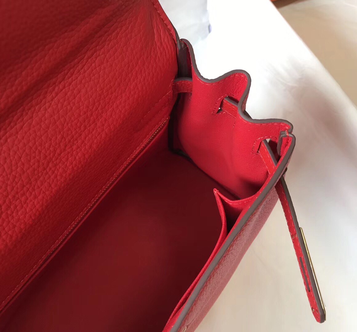 H**mes kelly 28cm retourne bag in red clemence leather
