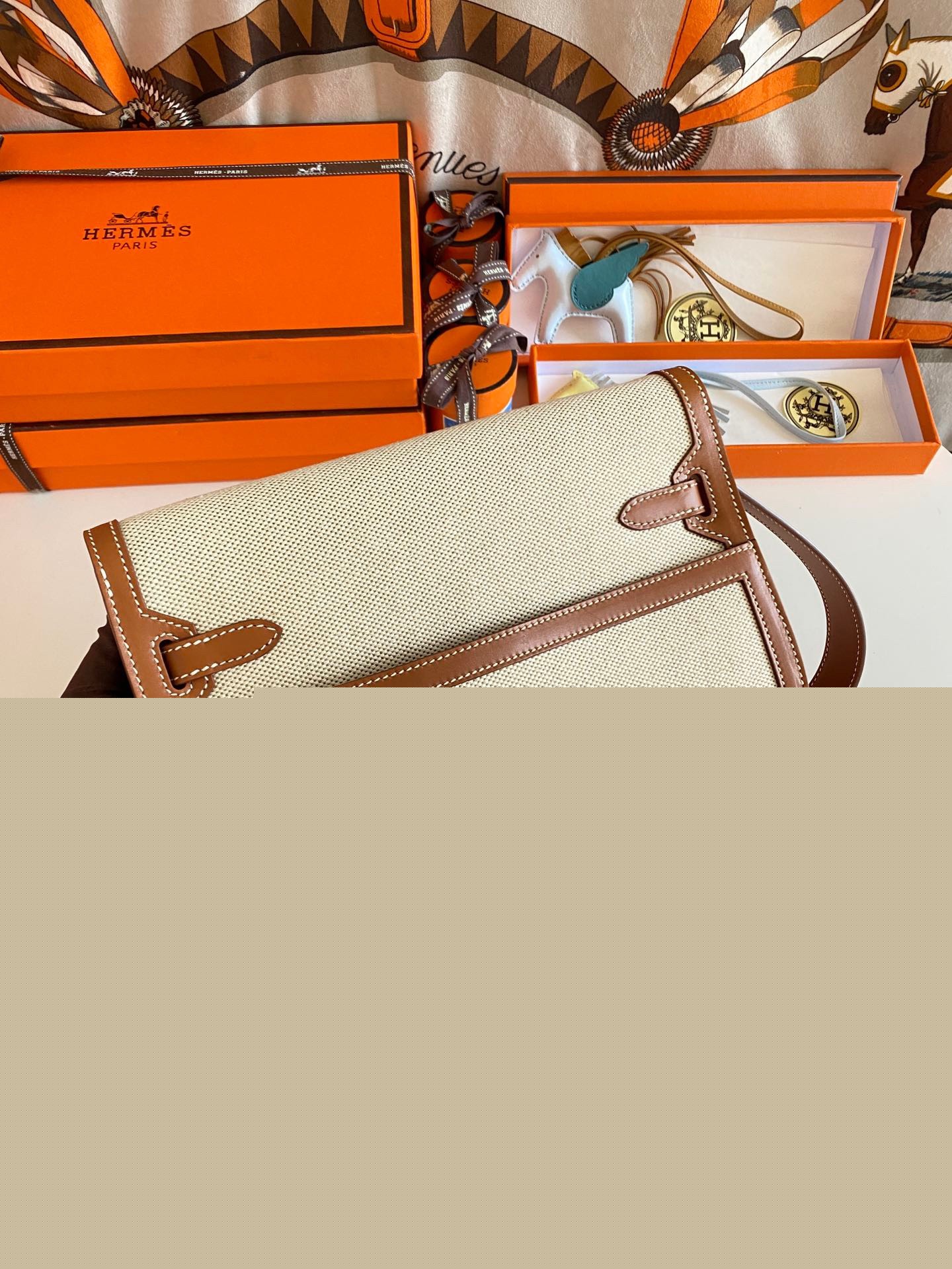 H**mes kelly depeches 25 pouch in ecru toile