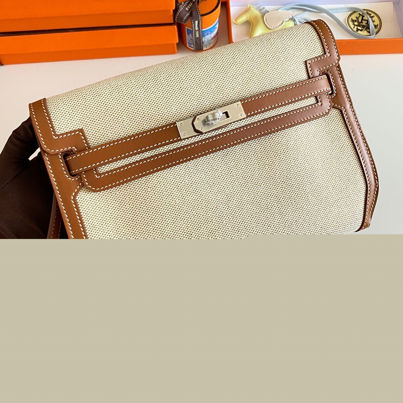 H**mes kelly depeches 25 pouch in ecru toile