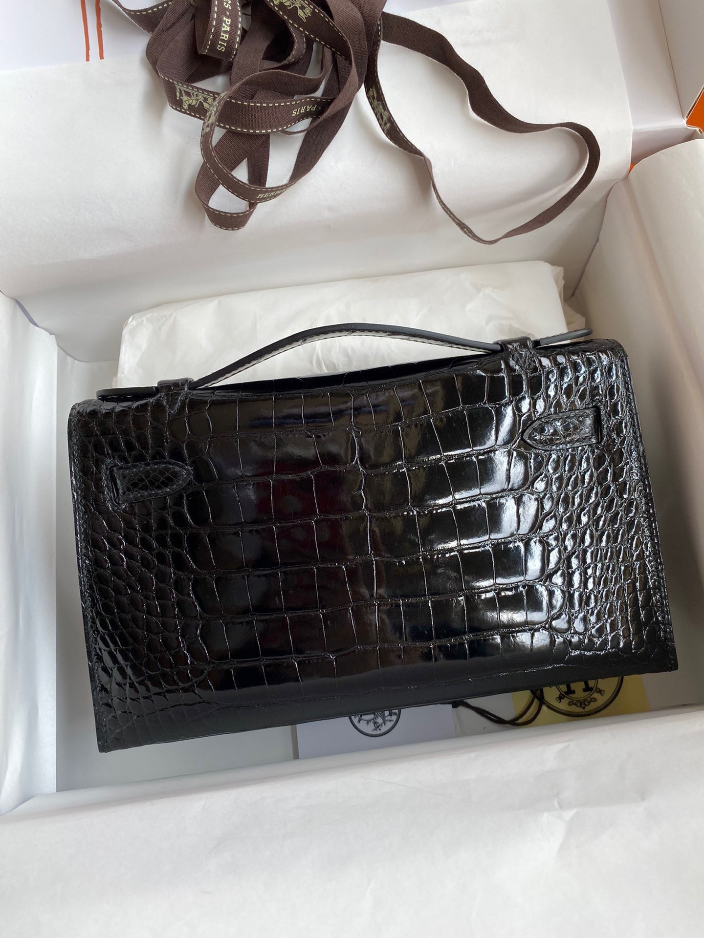 H**mes kelly pochette handmade bag in black shiny alligator leather