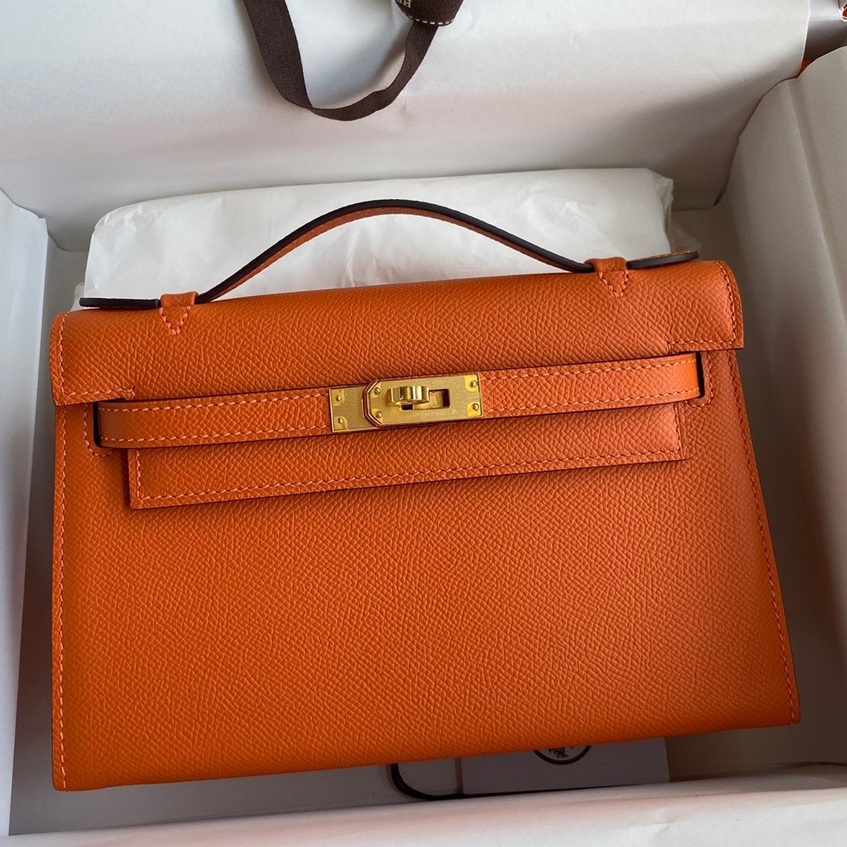 H**mes kelly pochette handmade bag in orange epsom calfskin