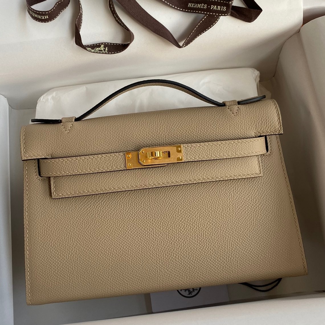 H**mes kelly pochette handmade bag in trench epsom calfskin