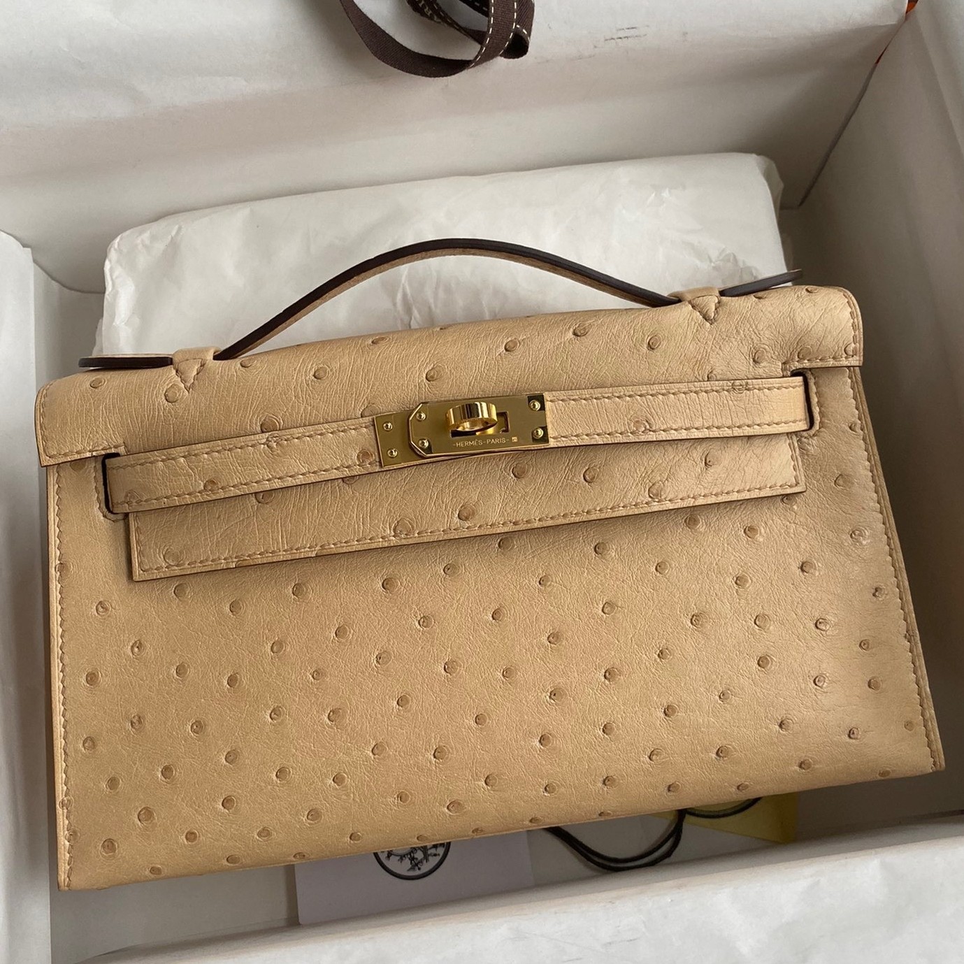 H**mes kelly pochette handmade bag in chai ostrich leather