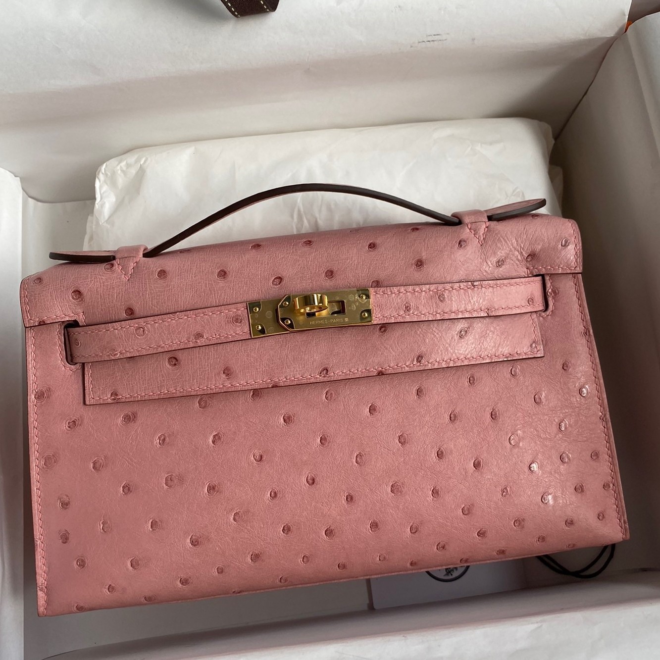 H**mes kelly pochette handmade bag in terre cuite ostrich leather