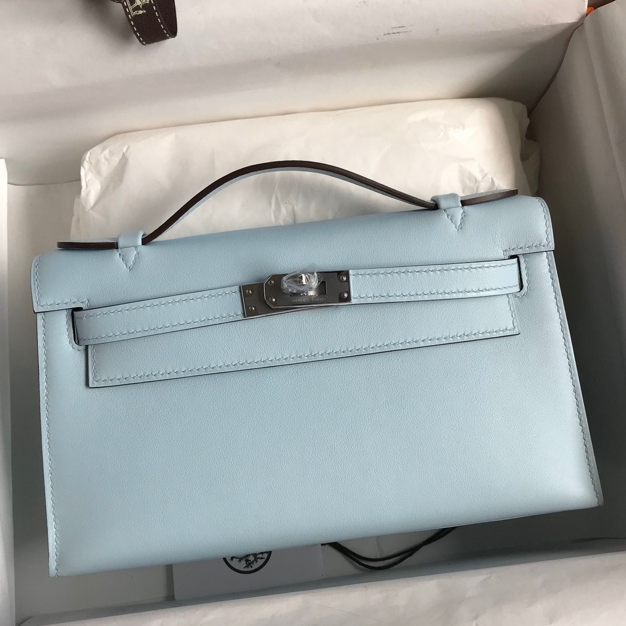 H**mes kelly pochette handmade bag in blue brume swift calfskin
