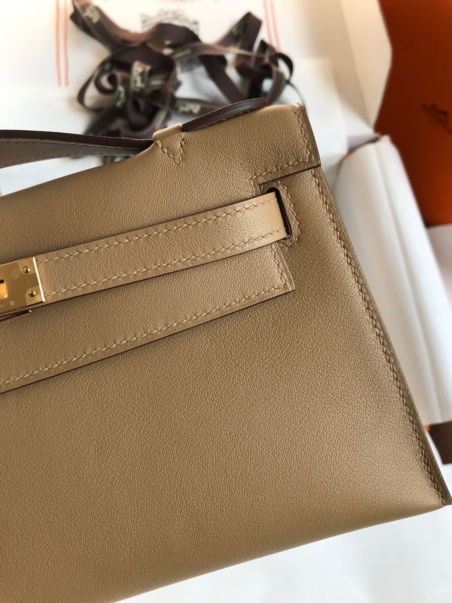 H**mes kelly pochette handmade bag in biscuit swift calfskin