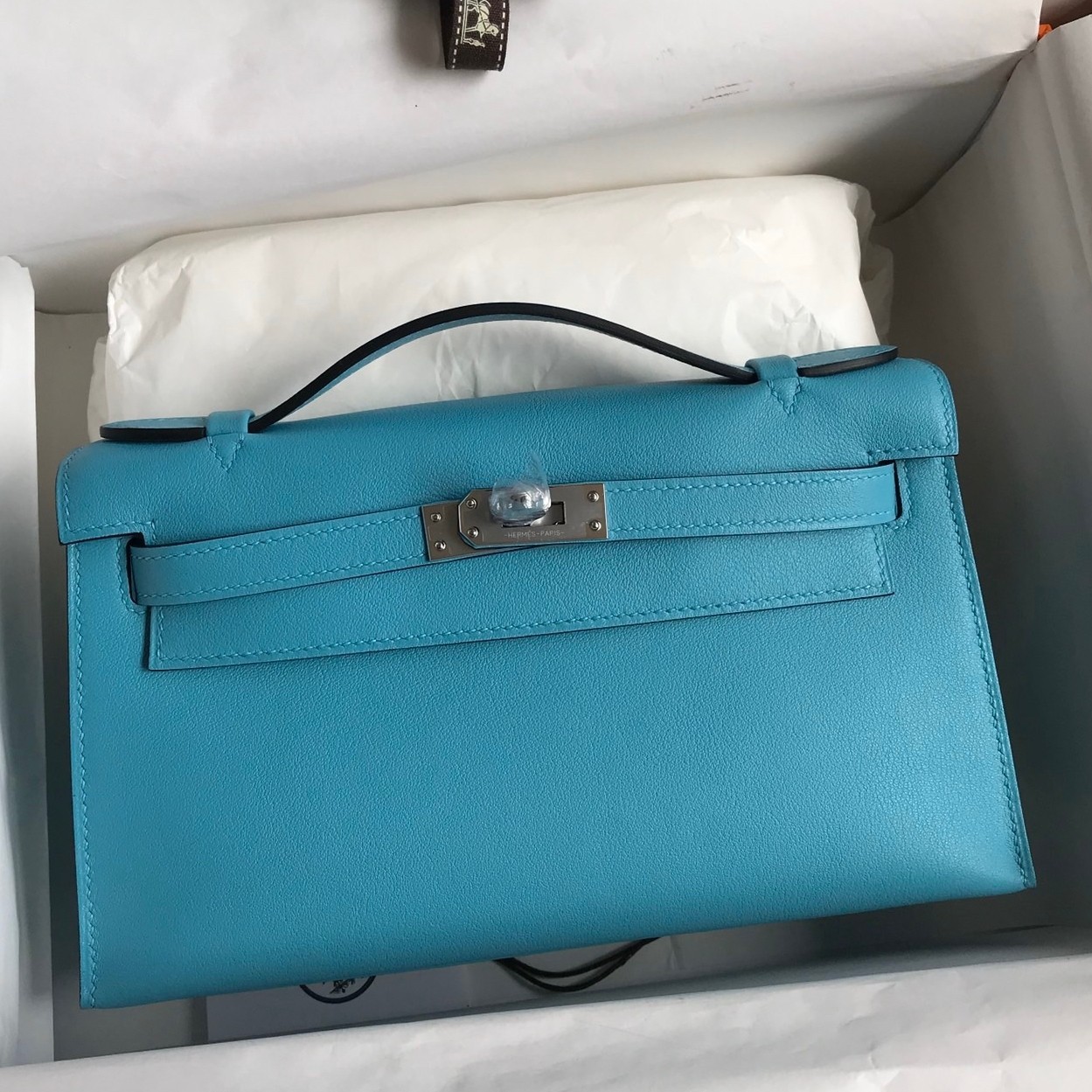 H**mes kelly pochette handmade bag in blue du nord swift calfskin