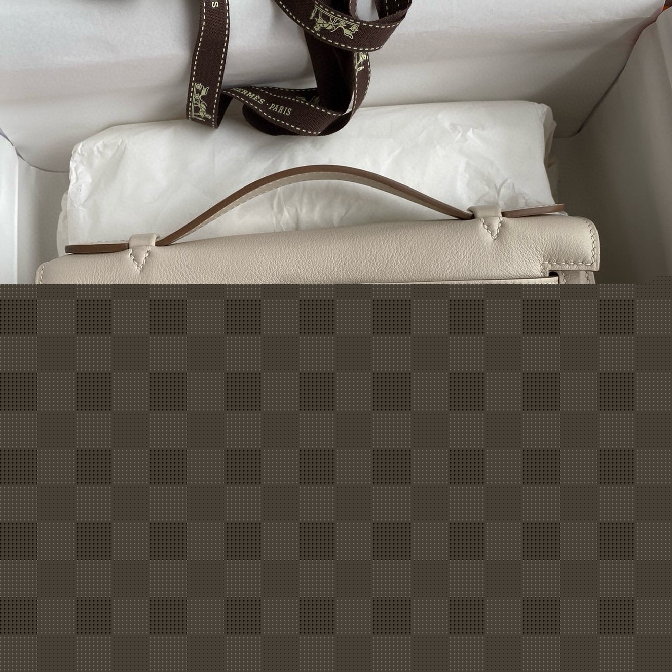 H**mes kelly pochette handmade bag in craie swift calfskin