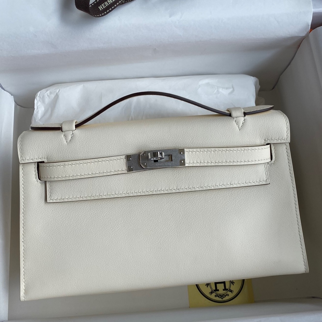 H**mes kelly pochette handmade bag in nata swift calfskin