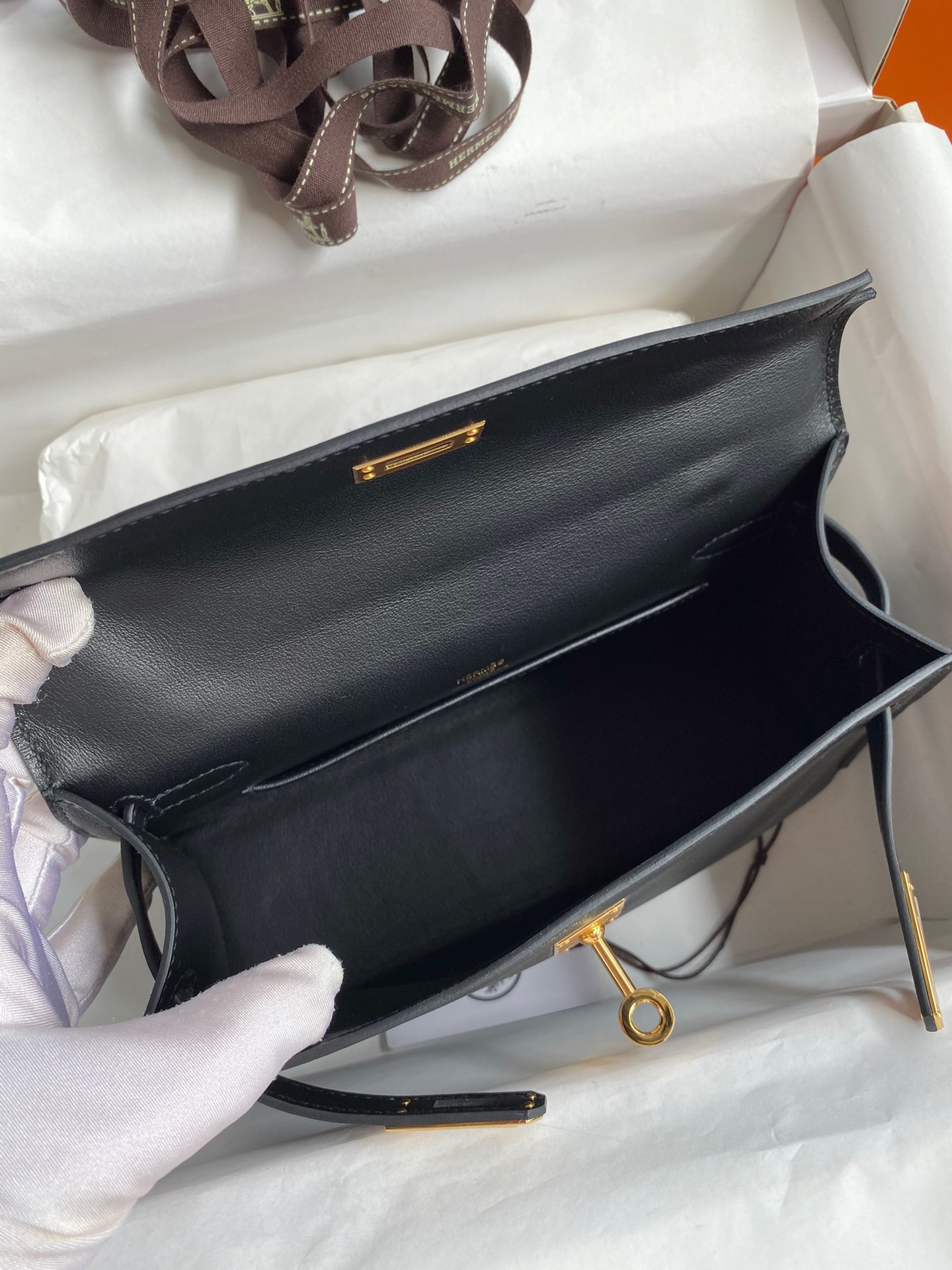 H**mes kelly pochette handmade bag in black swift calfskin