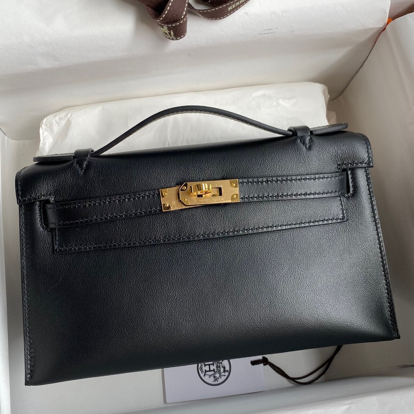 H**mes kelly pochette handmade bag in black swift calfskin