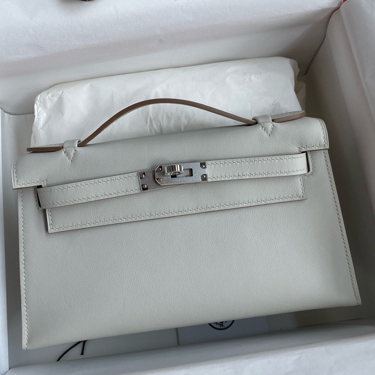 H**mes kelly pochette handmade bag in pearl grey swift calfskin
