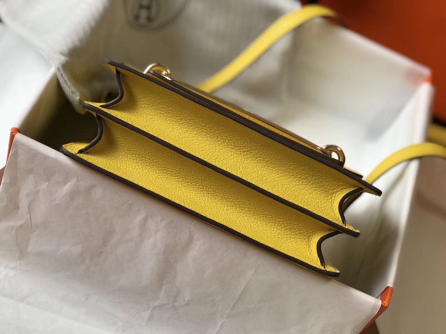 H**mes sac roulis mini bag in yellow evercolor calfskin