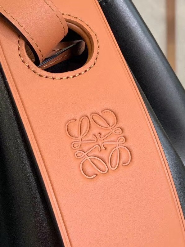 L0ew* medium balloon bucket bag in black/tan calfskin