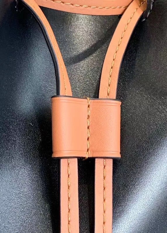 L0ew* medium balloon bucket bag in black/tan calfskin