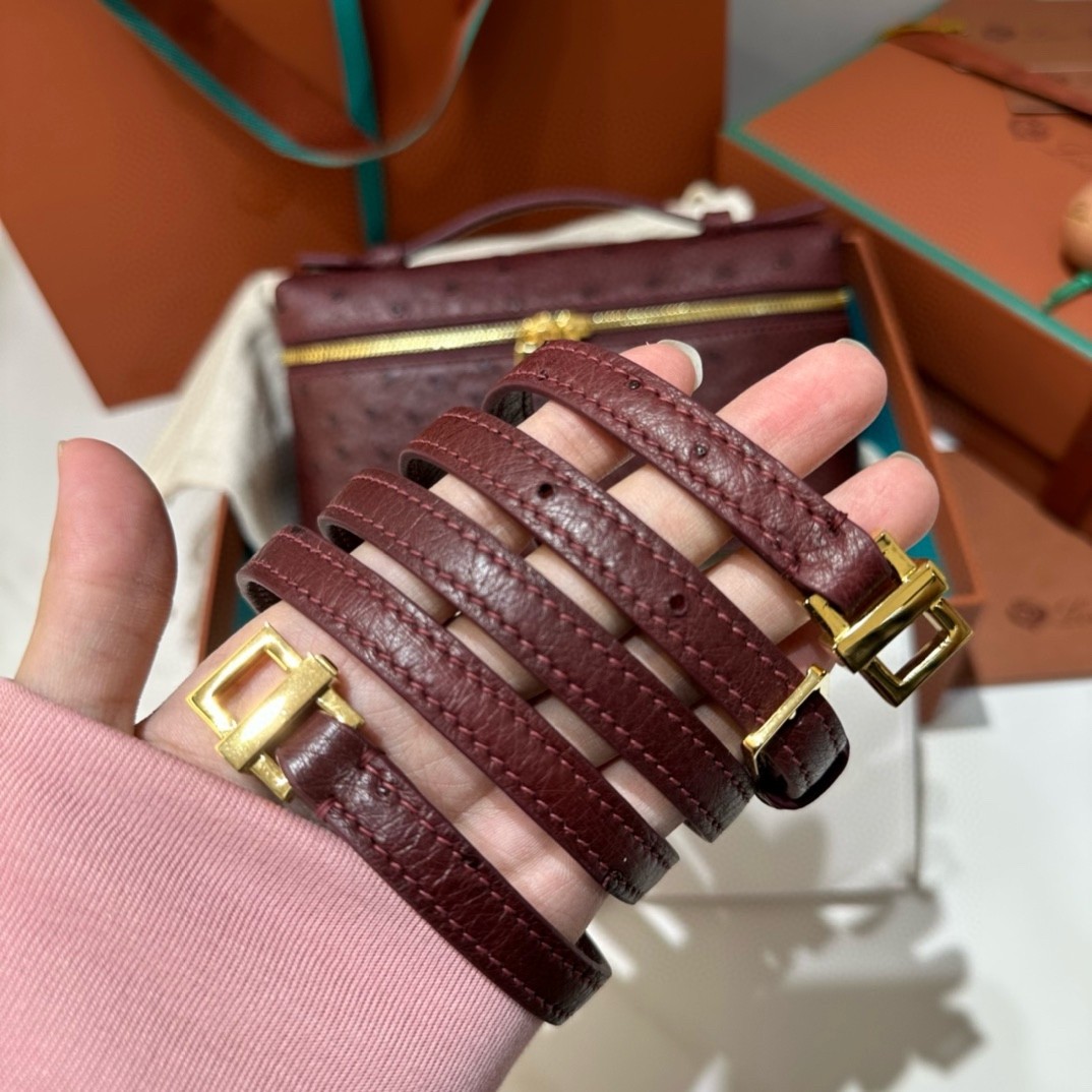L**o p*ana extra pocket pouch l19 in burgundy ostrich-embossed leather