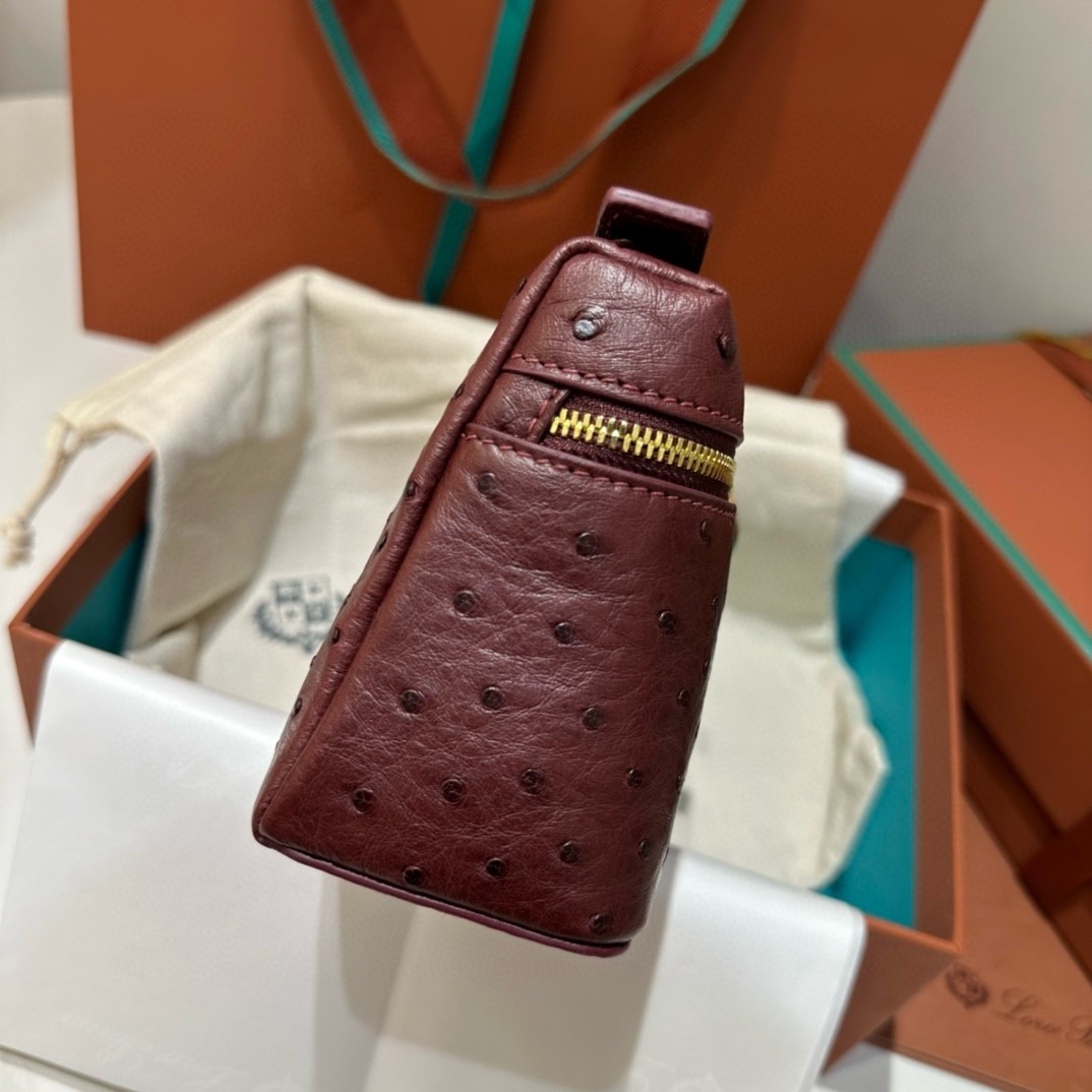 L**o p*ana extra pocket pouch l19 in burgundy ostrich-embossed leather