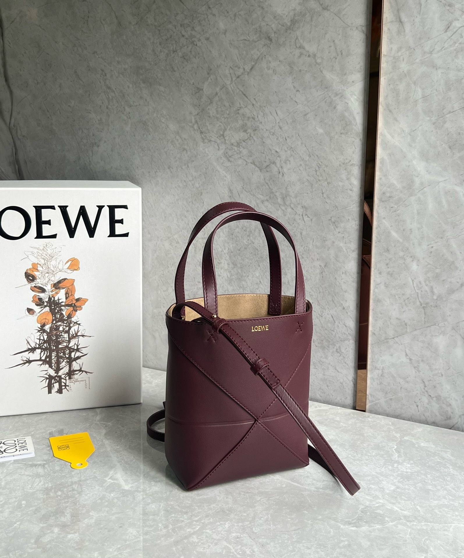 L0ew* mini puzzle fold tote bag in bordeaux calfskin