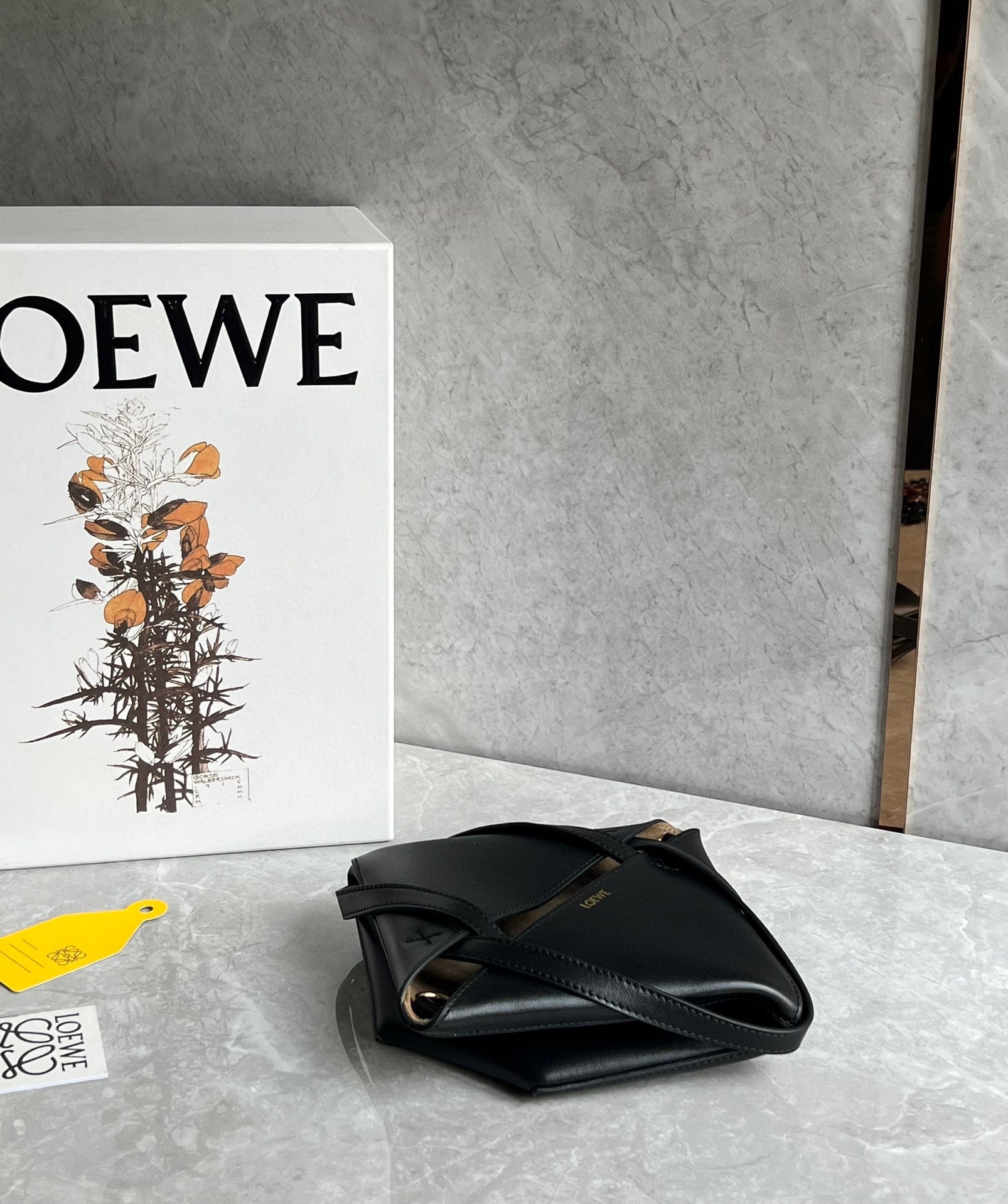 L0ew* mini puzzle fold tote bag in black calfskin