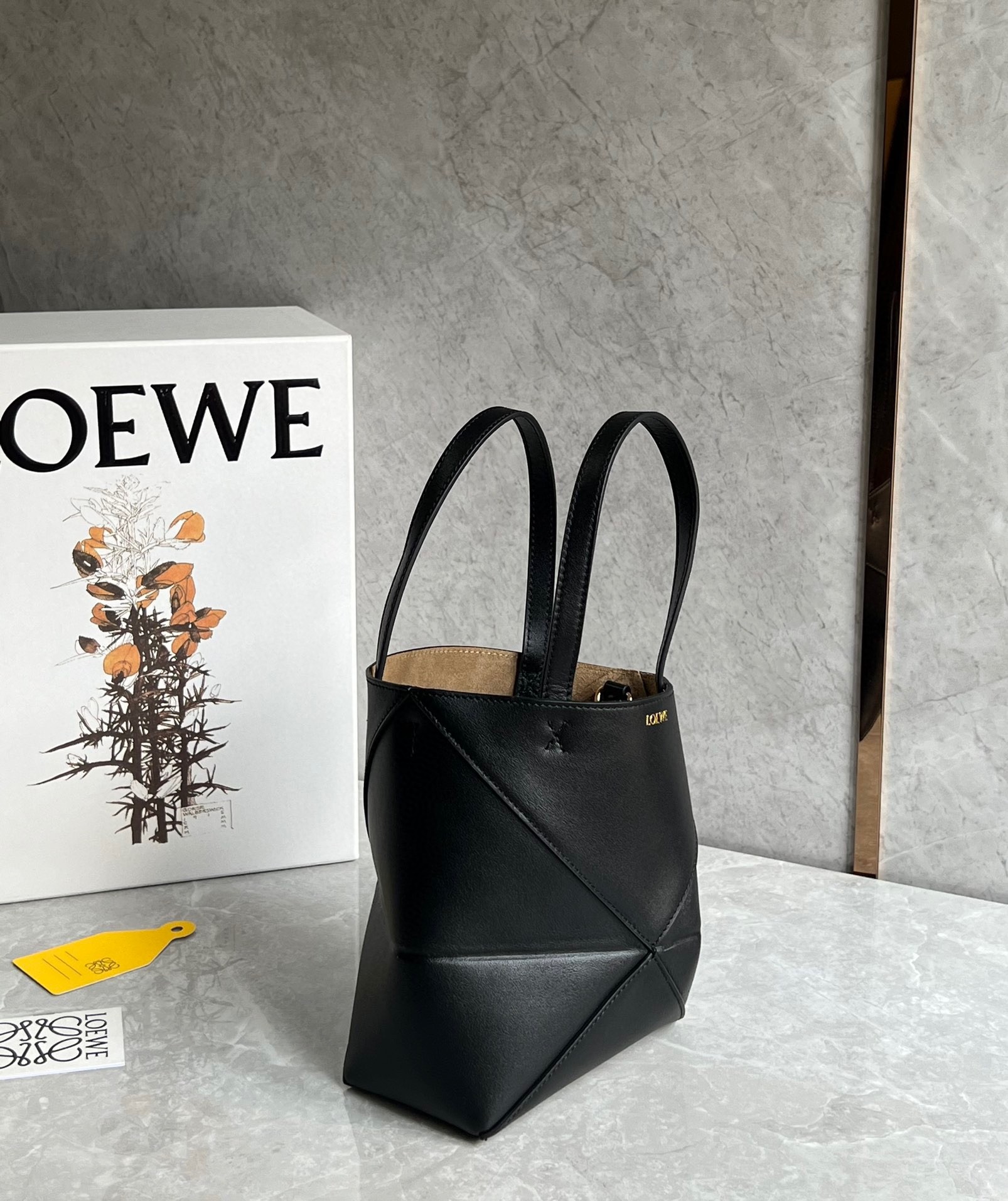 L0ew* mini puzzle fold tote bag in black calfskin