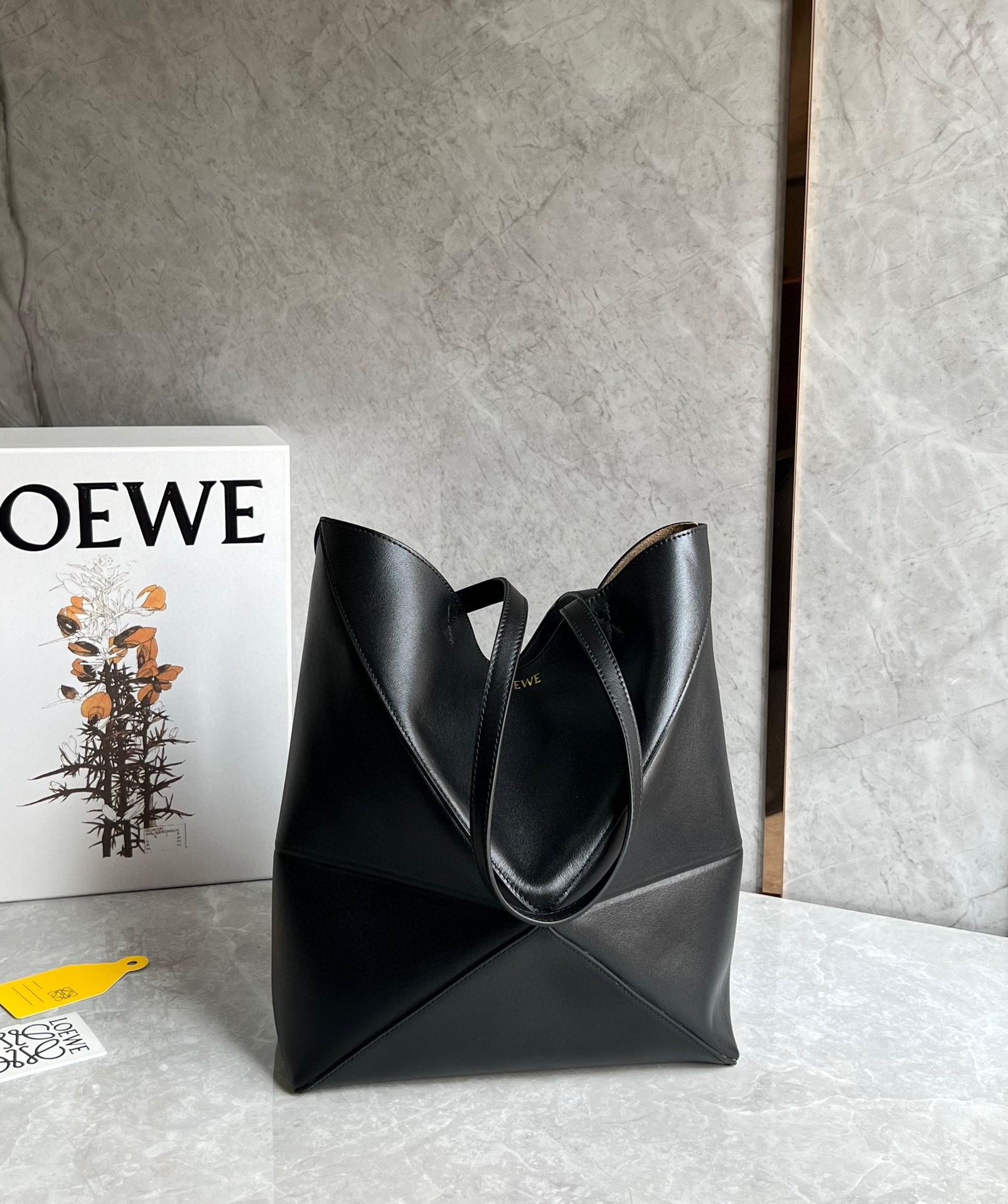L0ew* medium puzzle fold tote bag in black calfskin