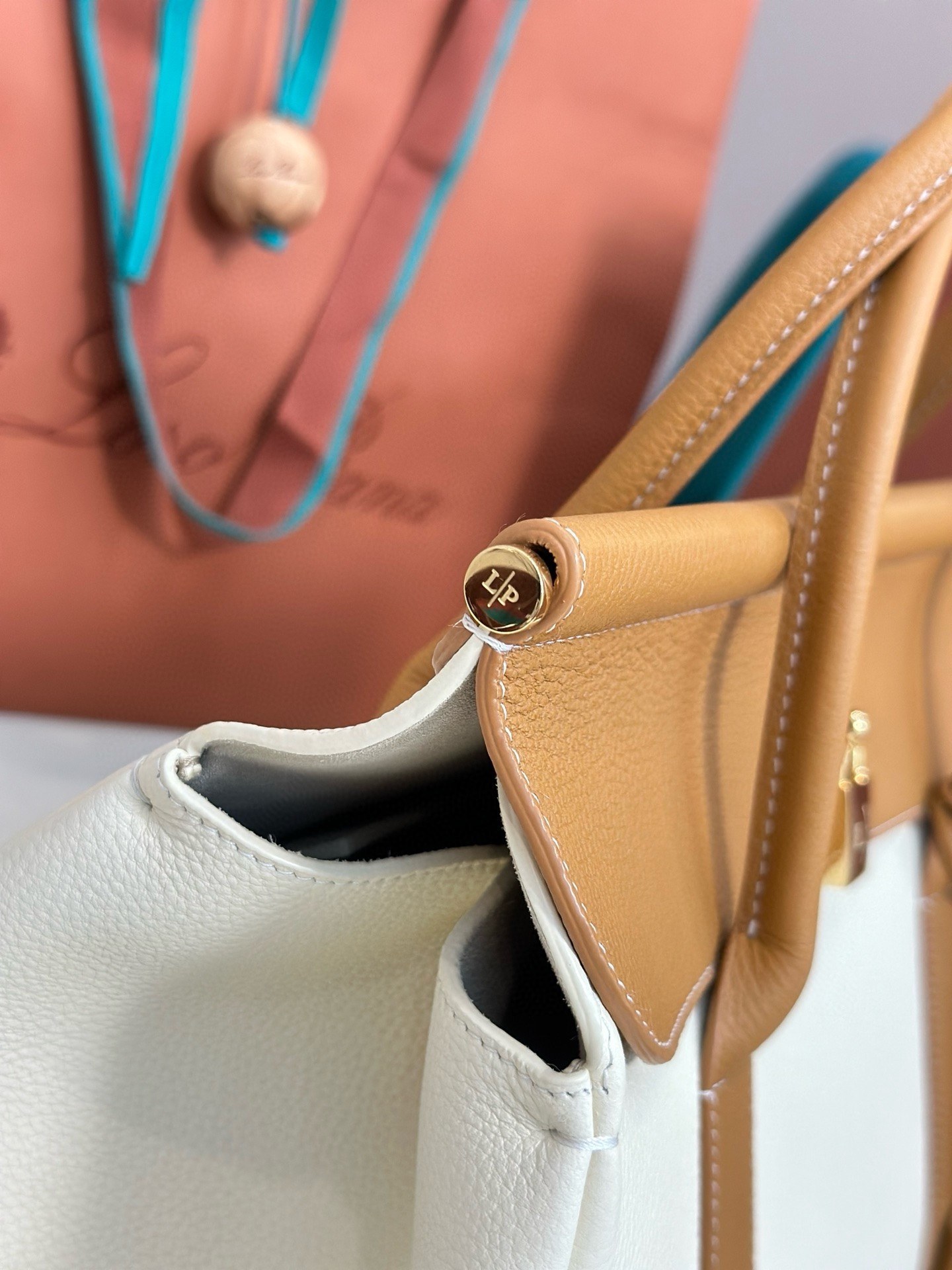 L**o p*ana loom l32 bag in white and tan grained leather