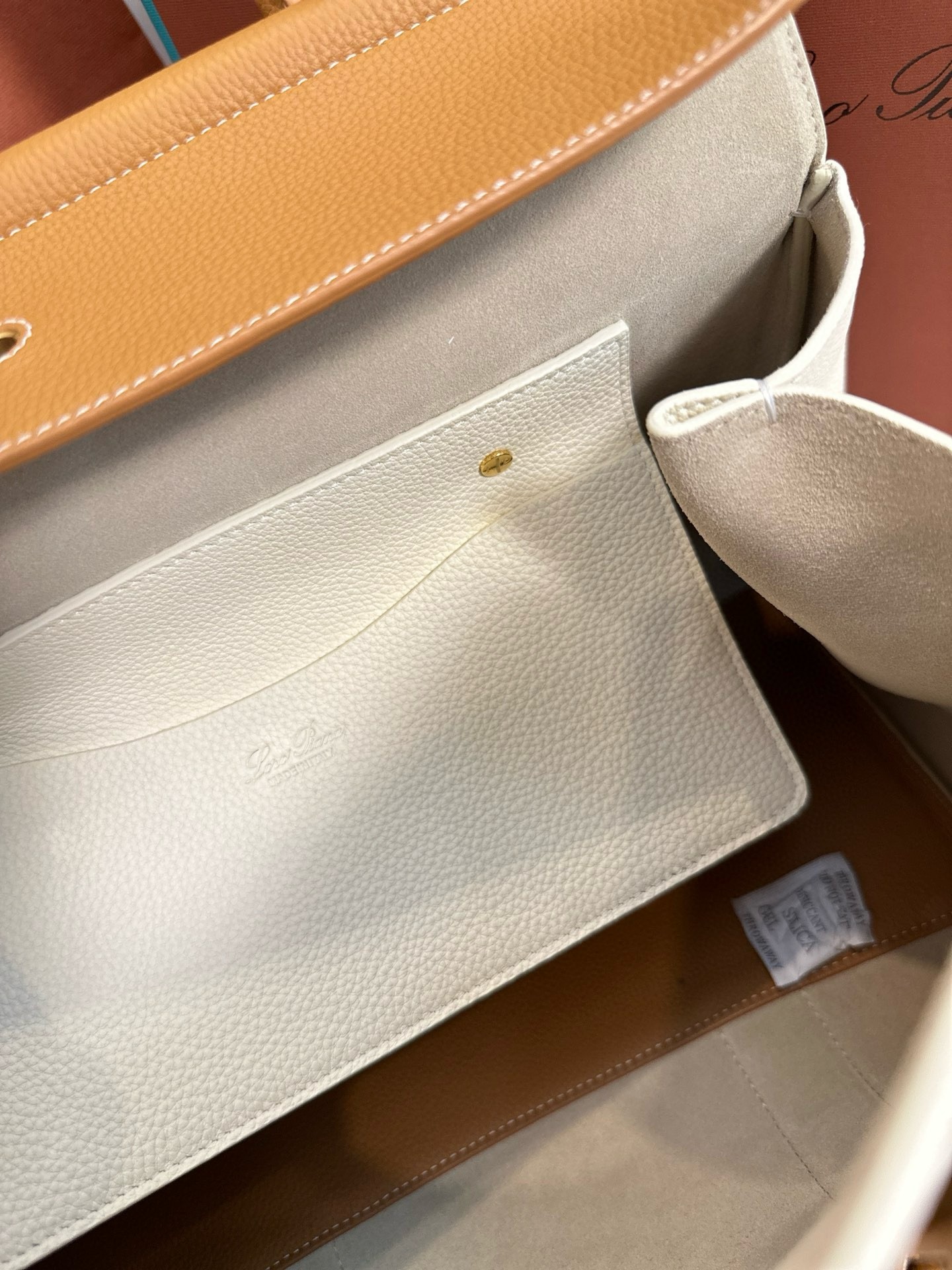 L**o p*ana loom l32 bag in white and tan grained leather