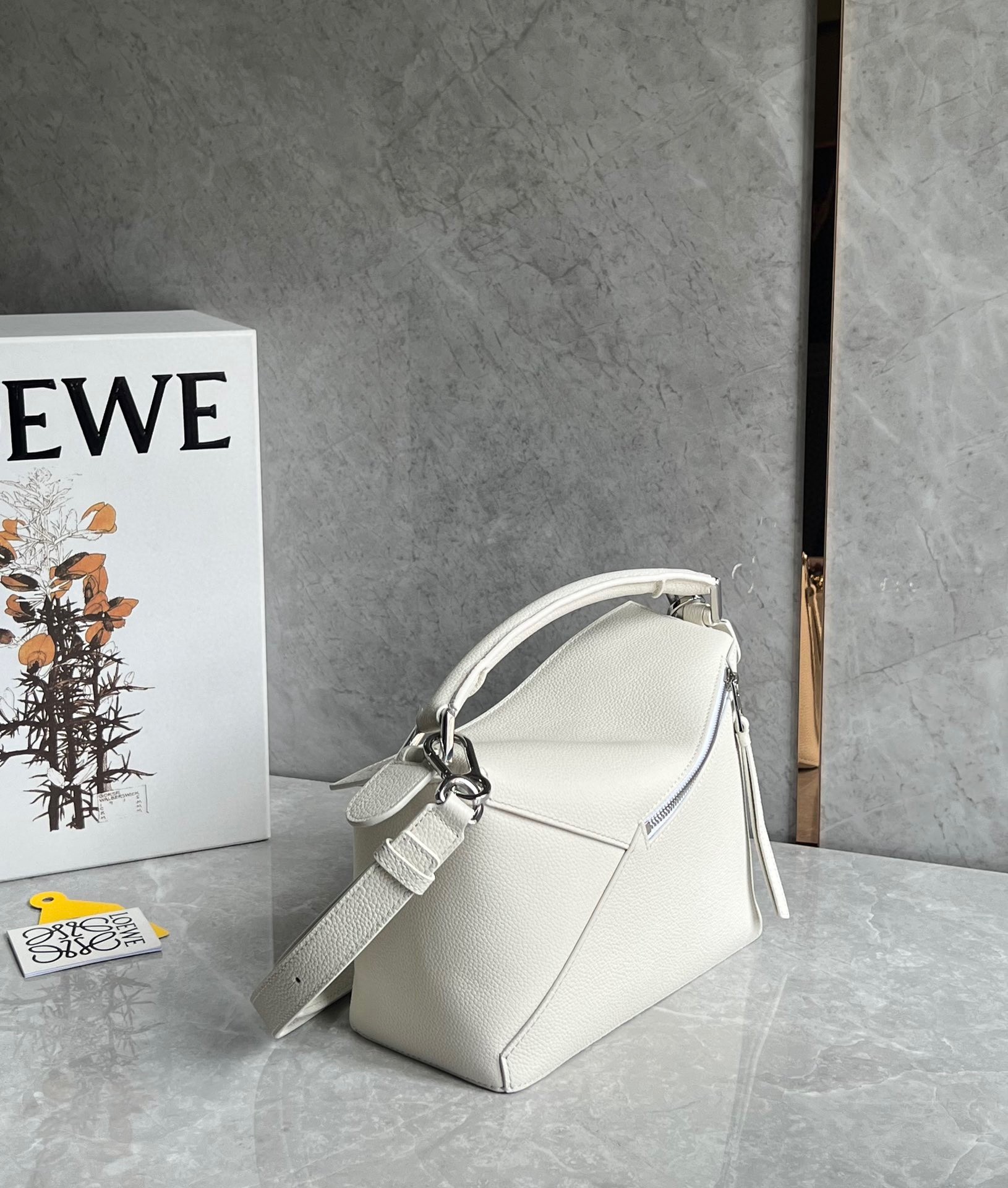 L0ew* puzzle small bag in white grained leather