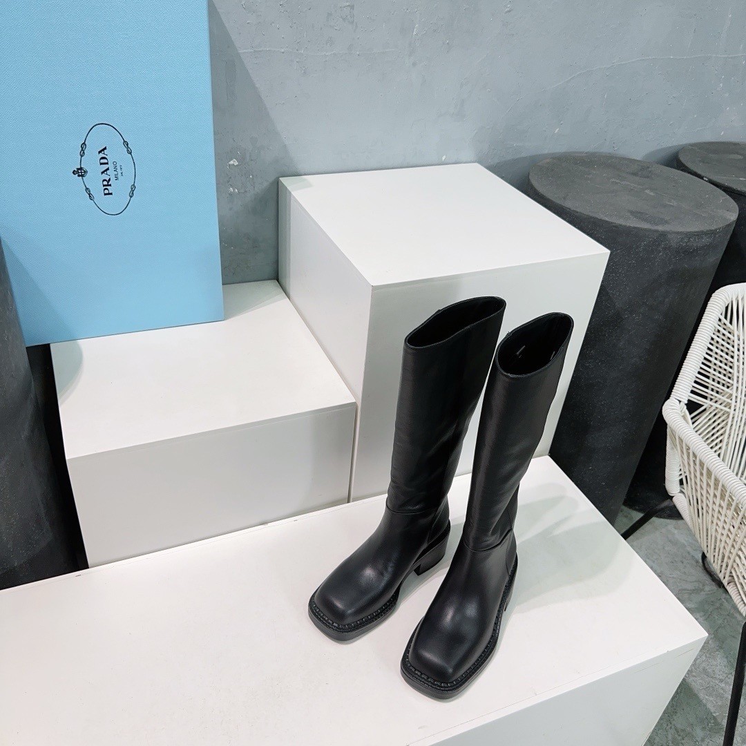 Pra*a knee-high boots 55mm in black leather