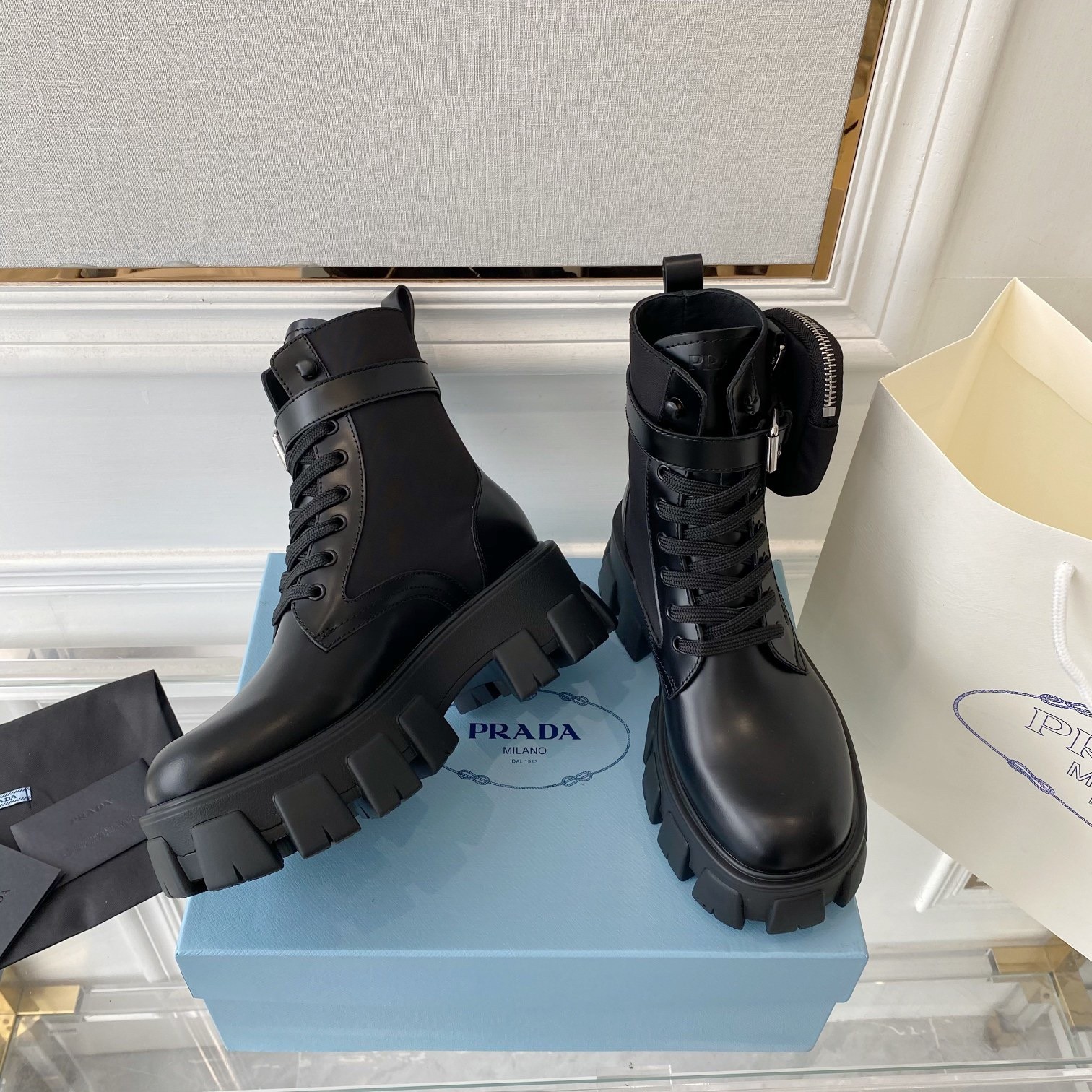 Pra*a monolith boots in black leather and nylon fabric