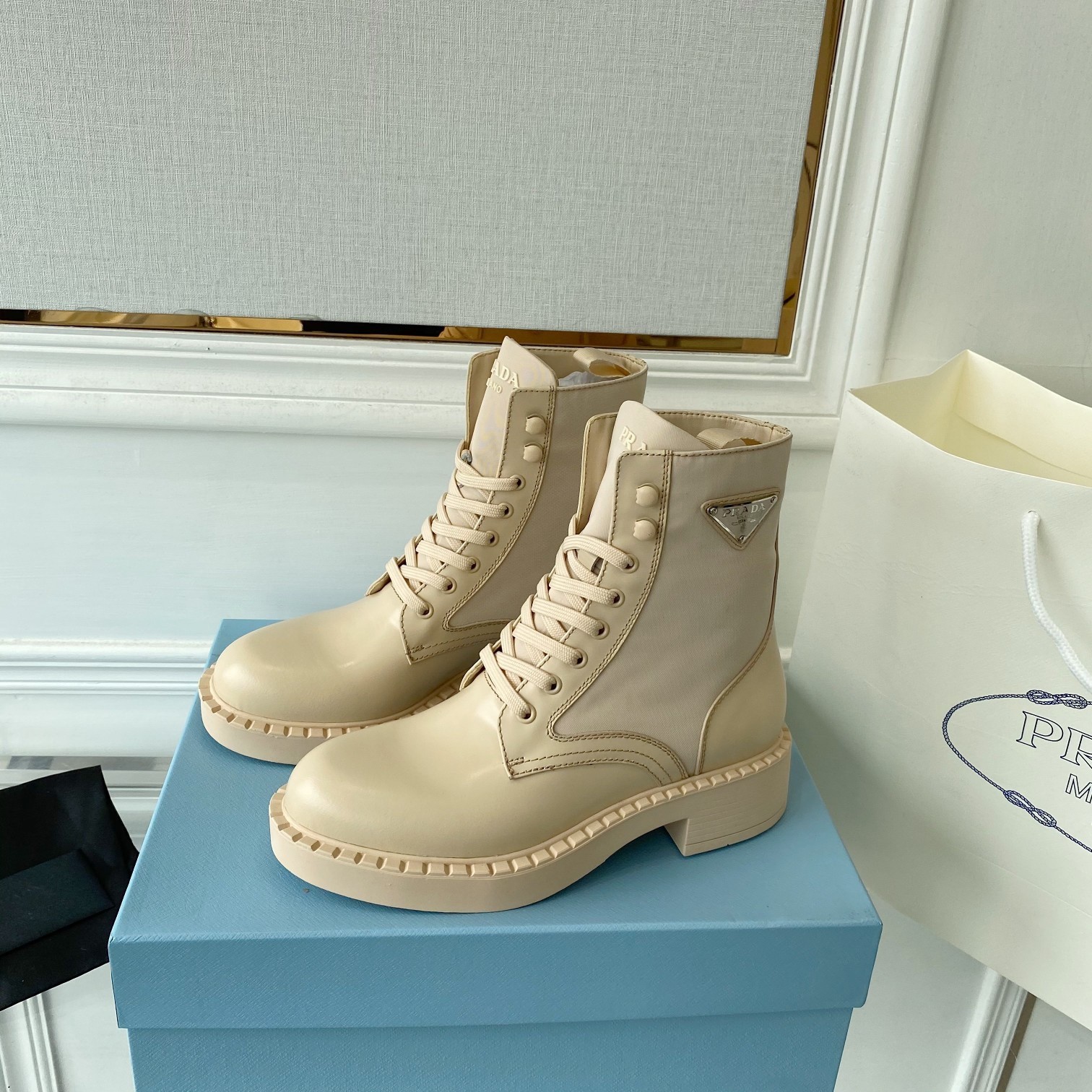 Pra*a ankle boots in beige brushed leather and re-nylon
