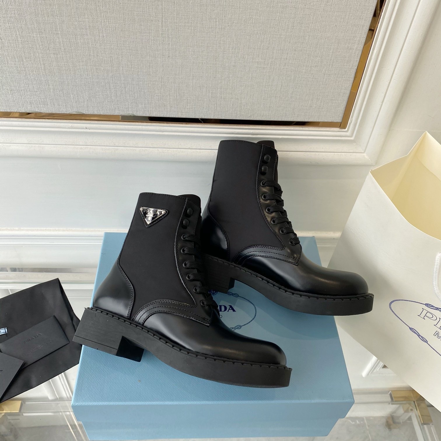 Pra*a ankle boots in black brushed leather and re-nylon