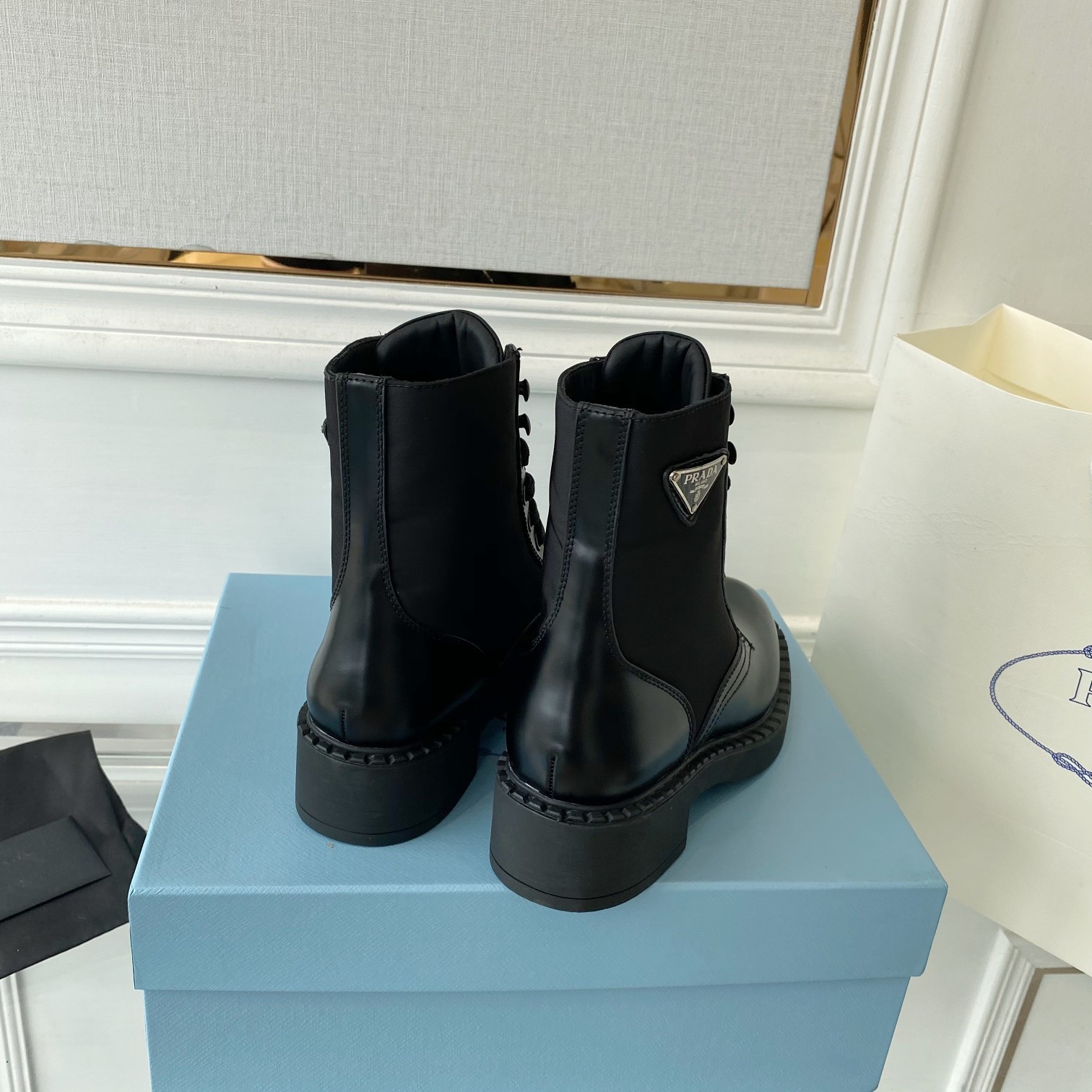 Pra*a ankle boots in black brushed leather and re-nylon