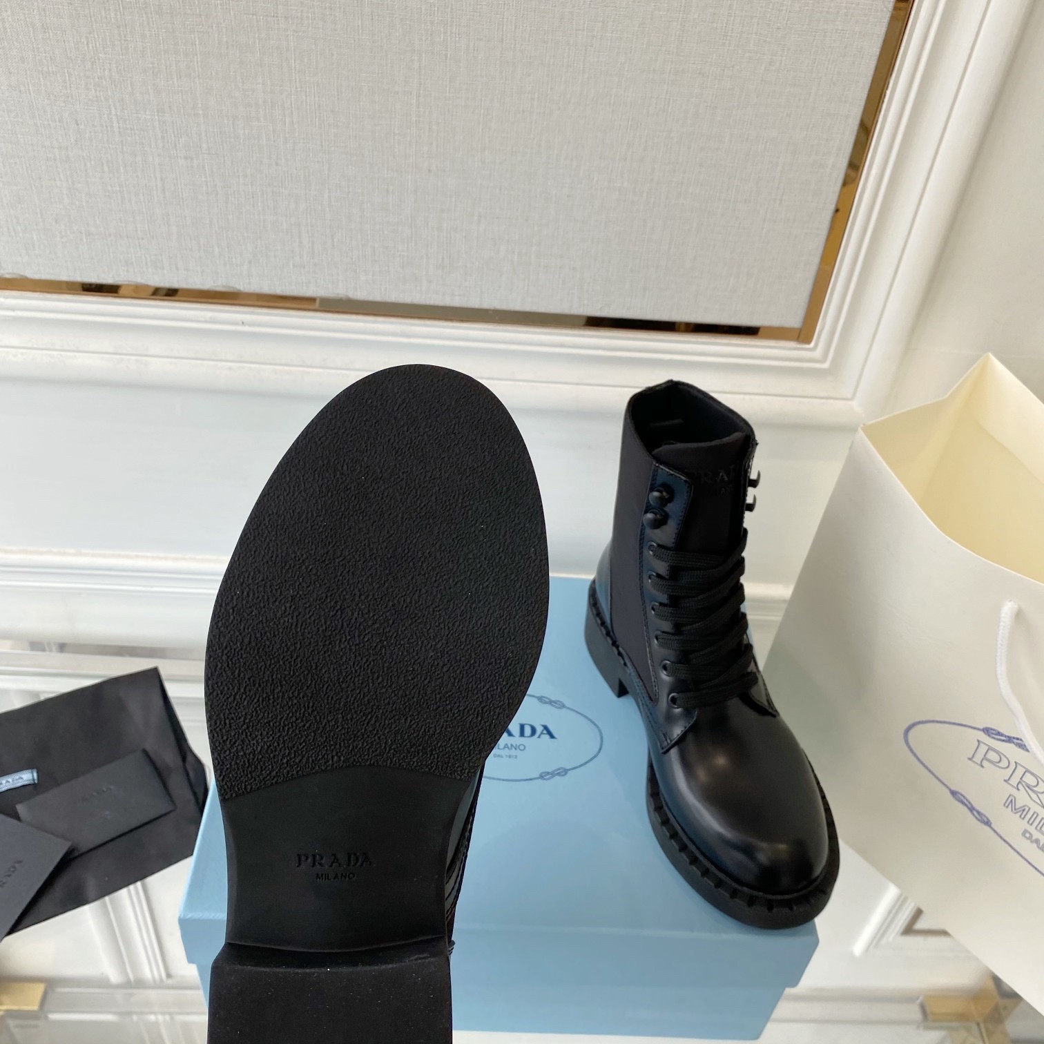 Pra*a ankle boots in black brushed leather and re-nylon