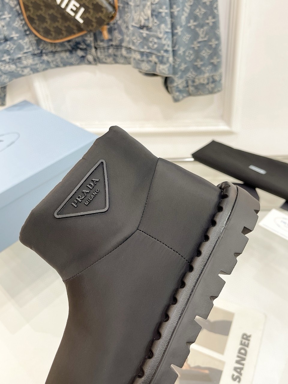 Pra*a booties in black nylon fabric