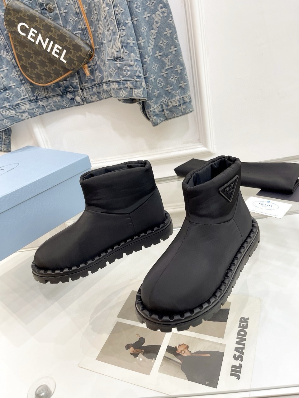 Pra*a booties in black nylon fabric