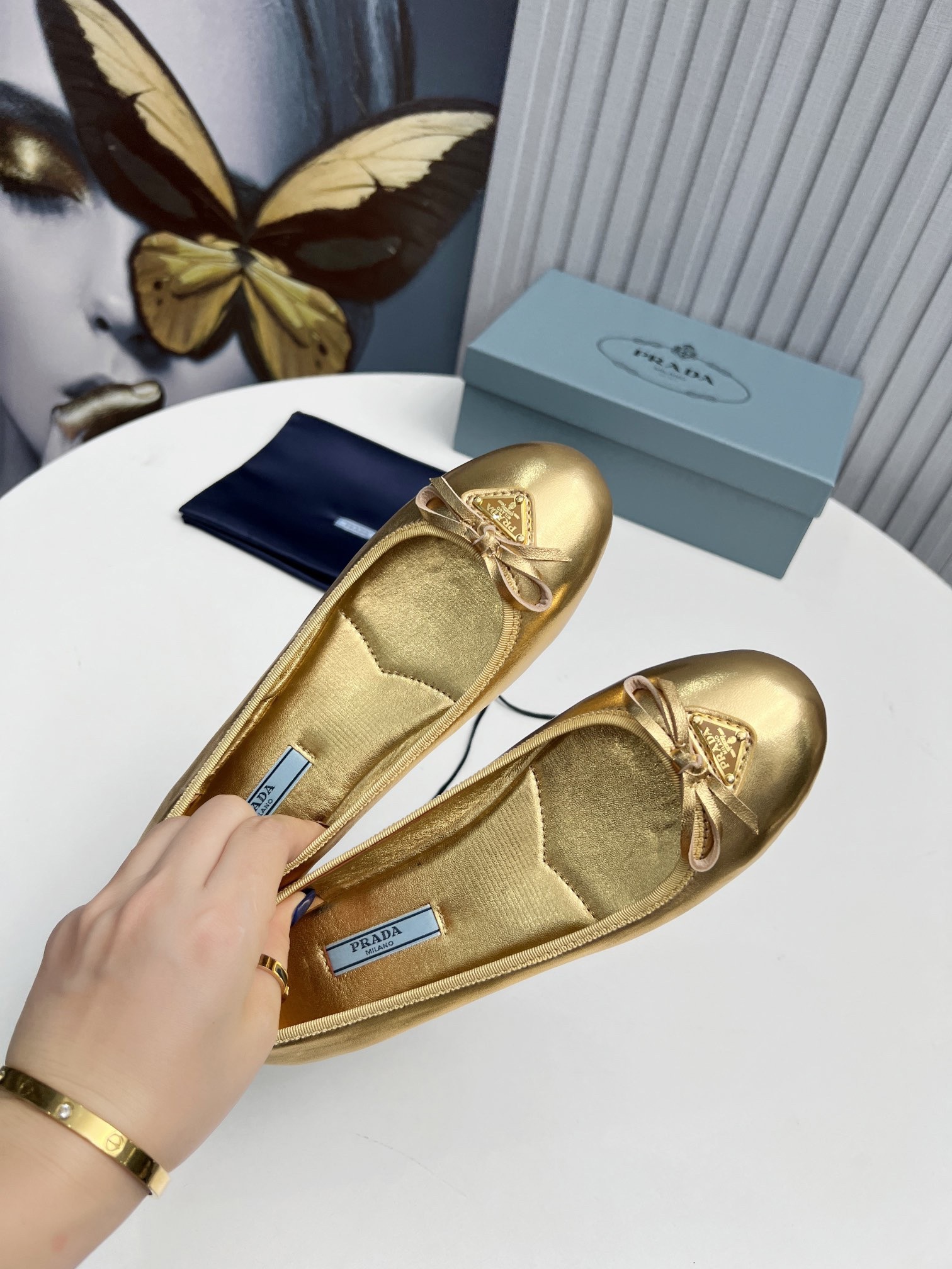 Pra*a ballerinas in gold nappa leather