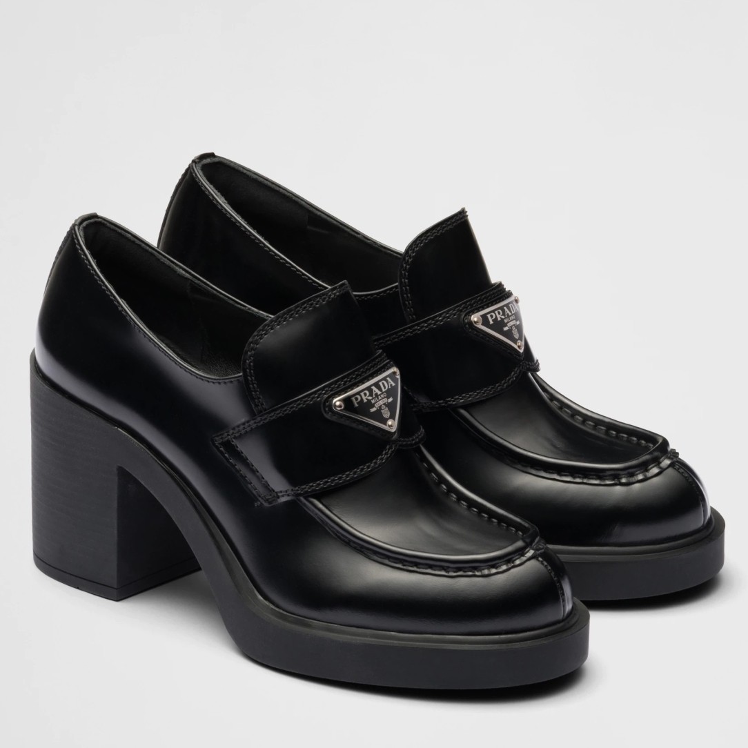 Pra*a chocolate high-heeled loafers in black brushed leather