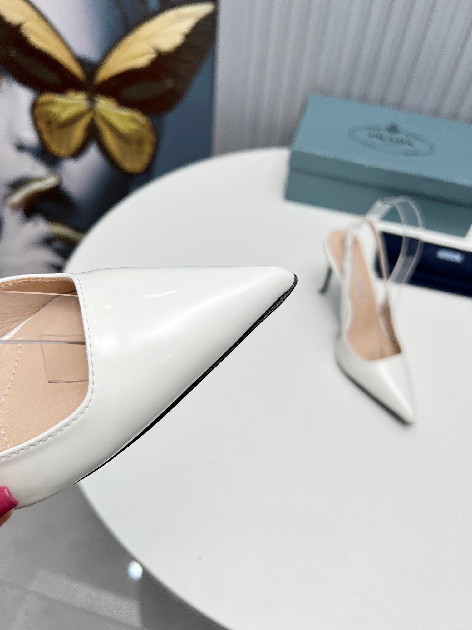 Pra*a slingbacks pumps 95mm in white patent leather