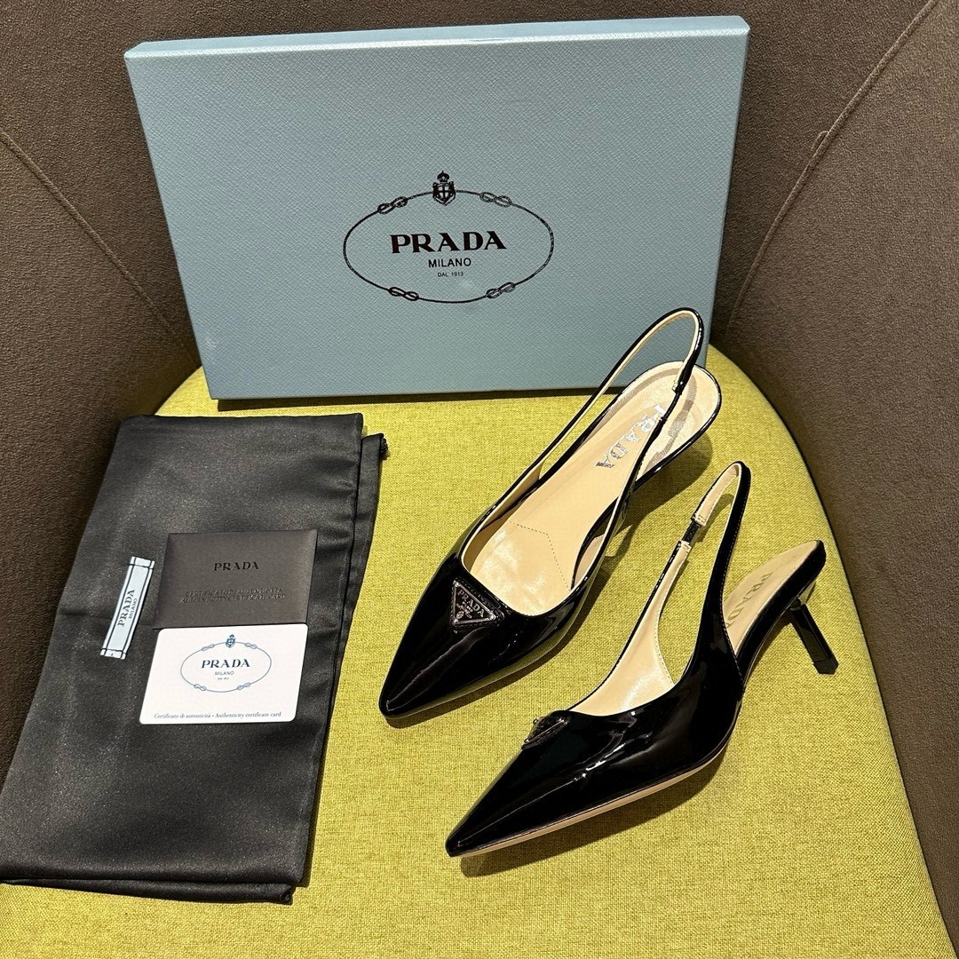 Pra*a slingback pumps 55mm in black patent leather