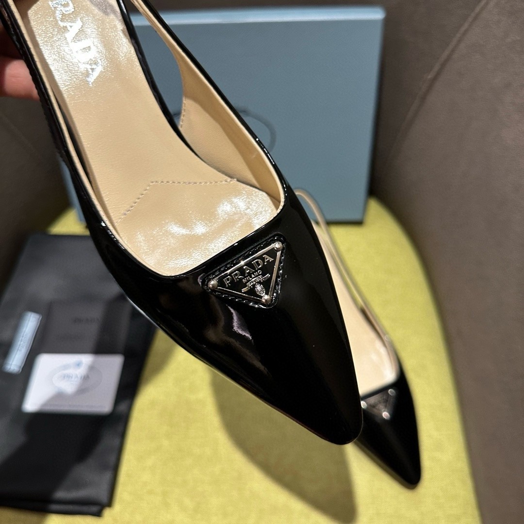 Pra*a slingback pumps 55mm in black patent leather