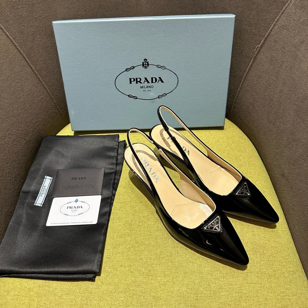 Pra*a slingback pumps 55mm in black patent leather