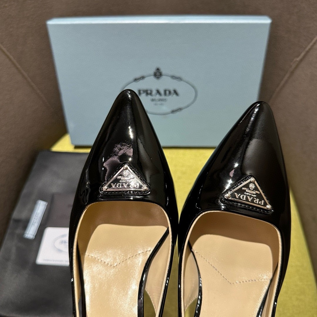 Pra*a slingback pumps 55mm in black patent leather