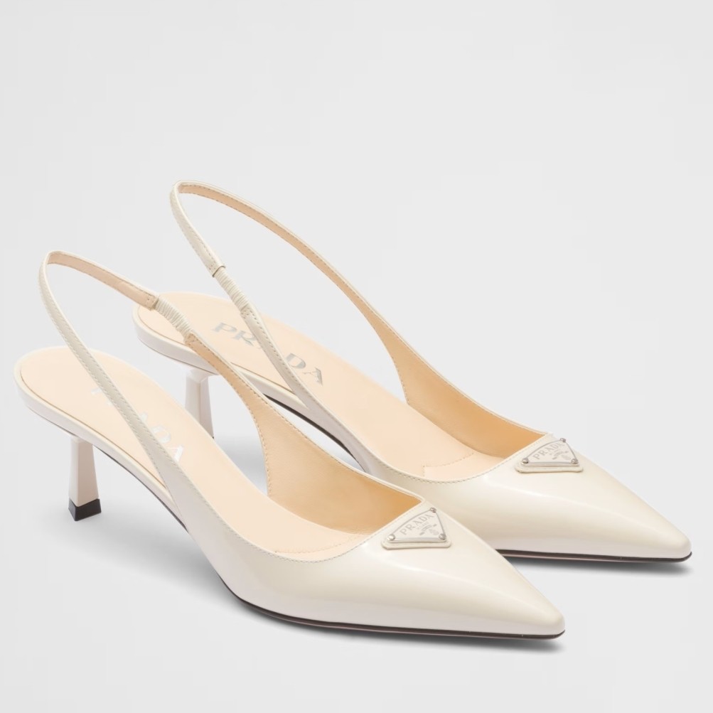 Pra*a slingback pumps 55mm in white patent leather