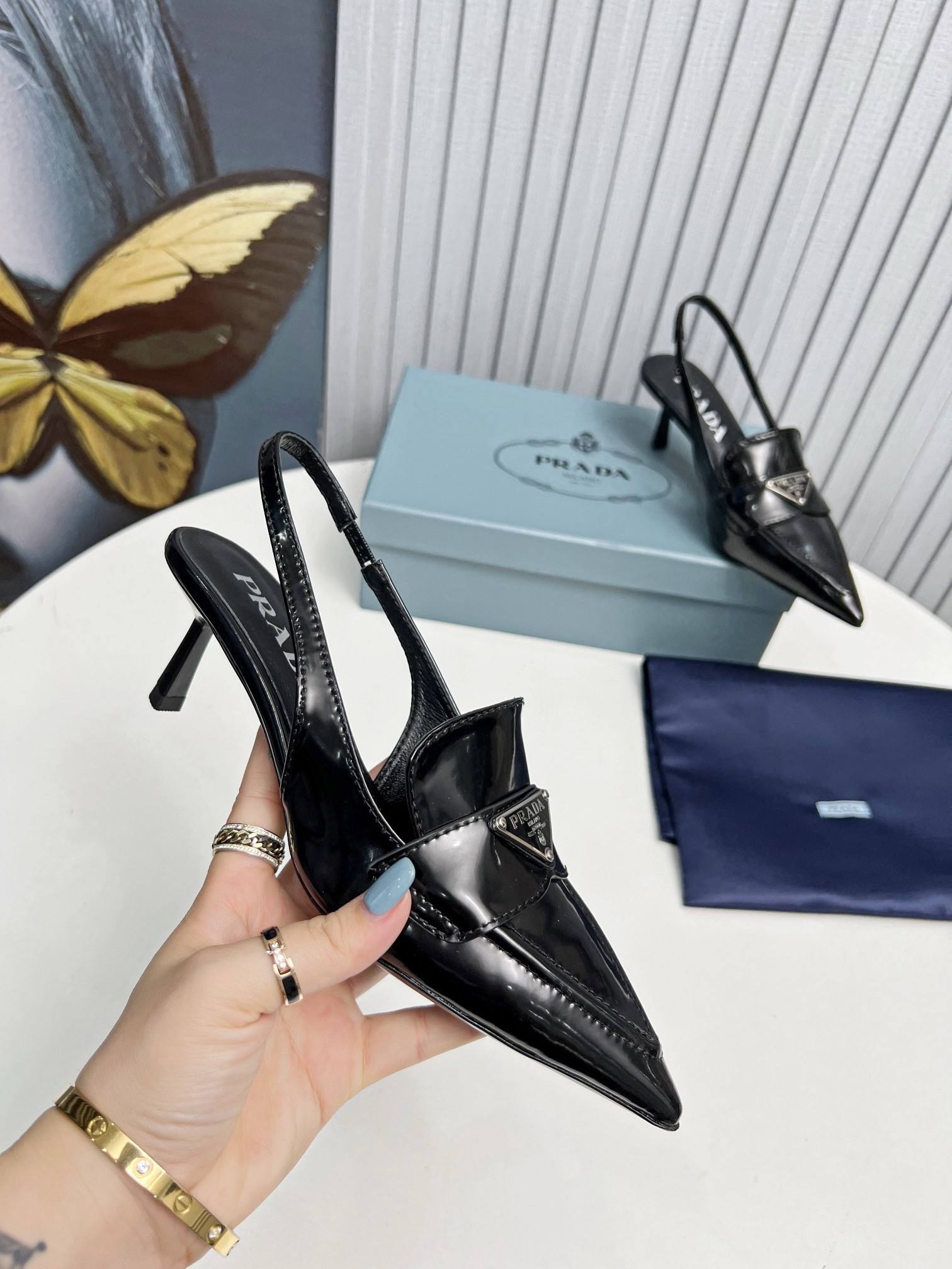 Pra*a slingback pumps 45mm in black patent calfskin